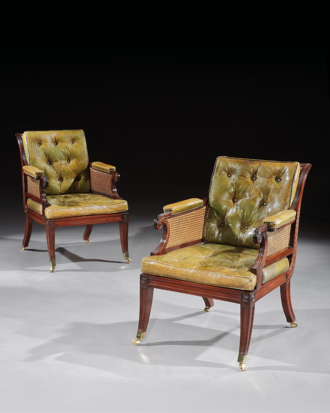 A PAIR OF REGENCY MAHOGANY BERGERES, English, circa 1815