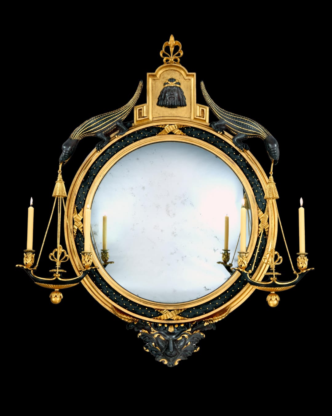 A GEORGE III GILTWOOD AND BRONZE PAINTED CONVEX MIRROR, English, between 1798-1805