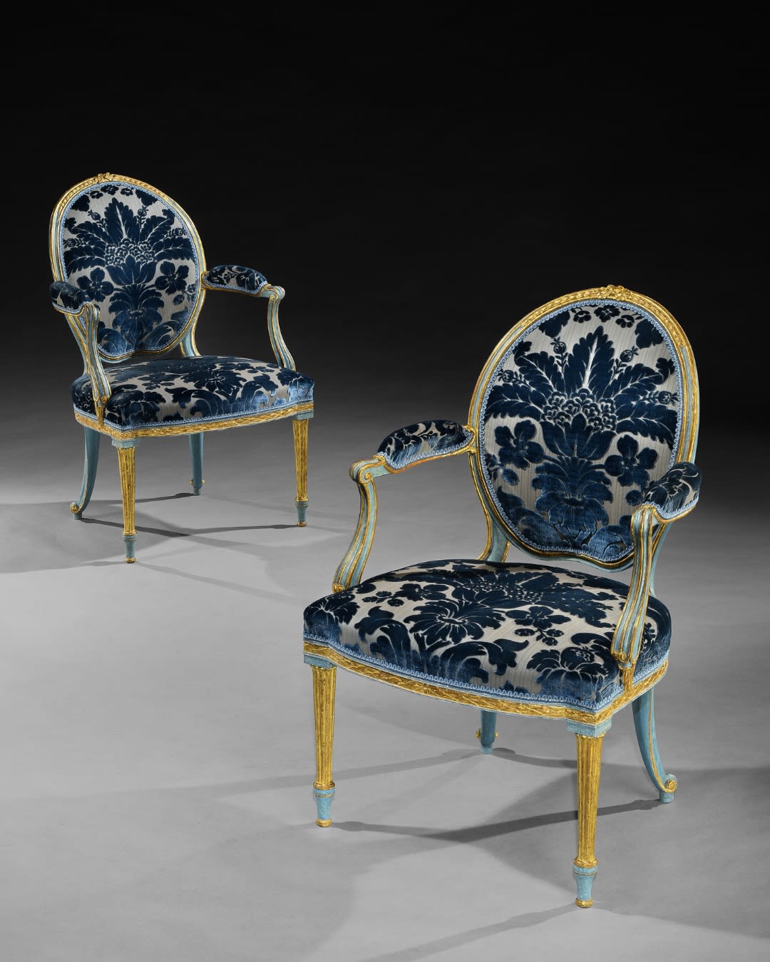 A PAIR OF GEORGE III ARMCHAIRS ALMOST CERTAINLY BY THOMAS CHIPPENDALE , English, circa 1780