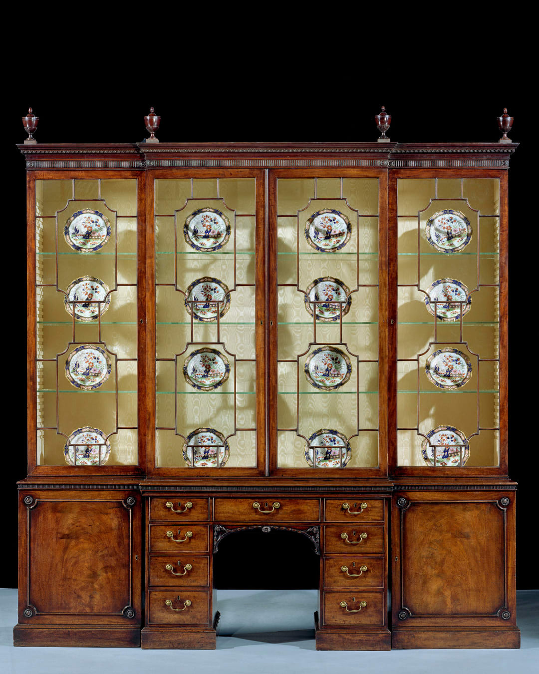 A GEORGE III MAHOGANY BREAKFRONT BOOKCASE, English, circa 1770