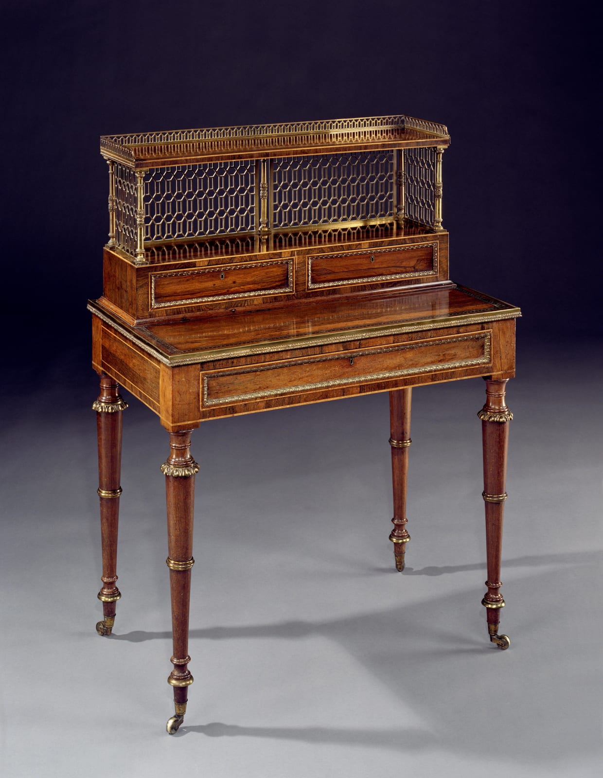 A REGENCY ROSEWOOD BONHEUR DU JOUR, English, circa 1810