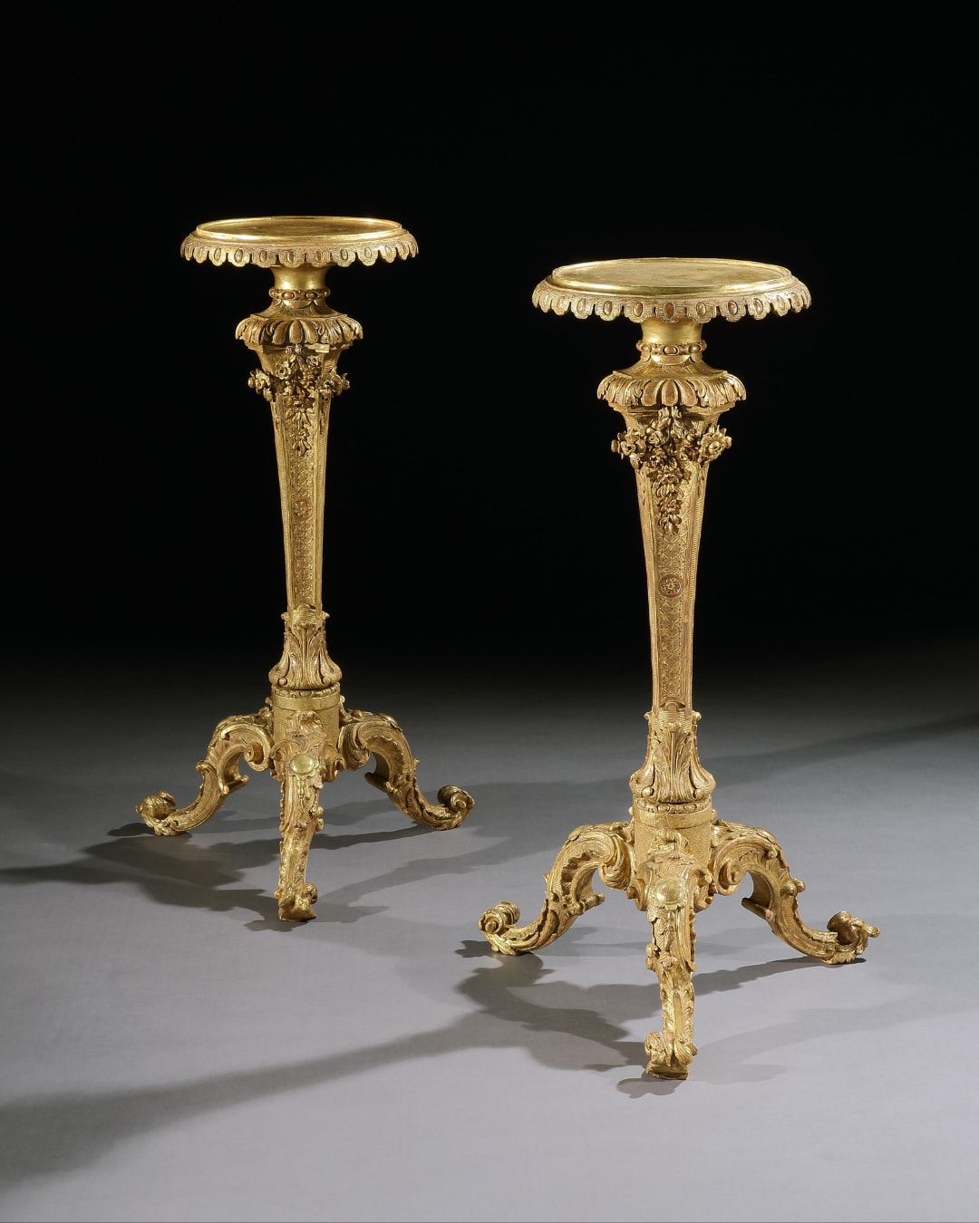 A PAIR OF GEORGE II GILTWOOD TORCHÈRES, English, circa 1745