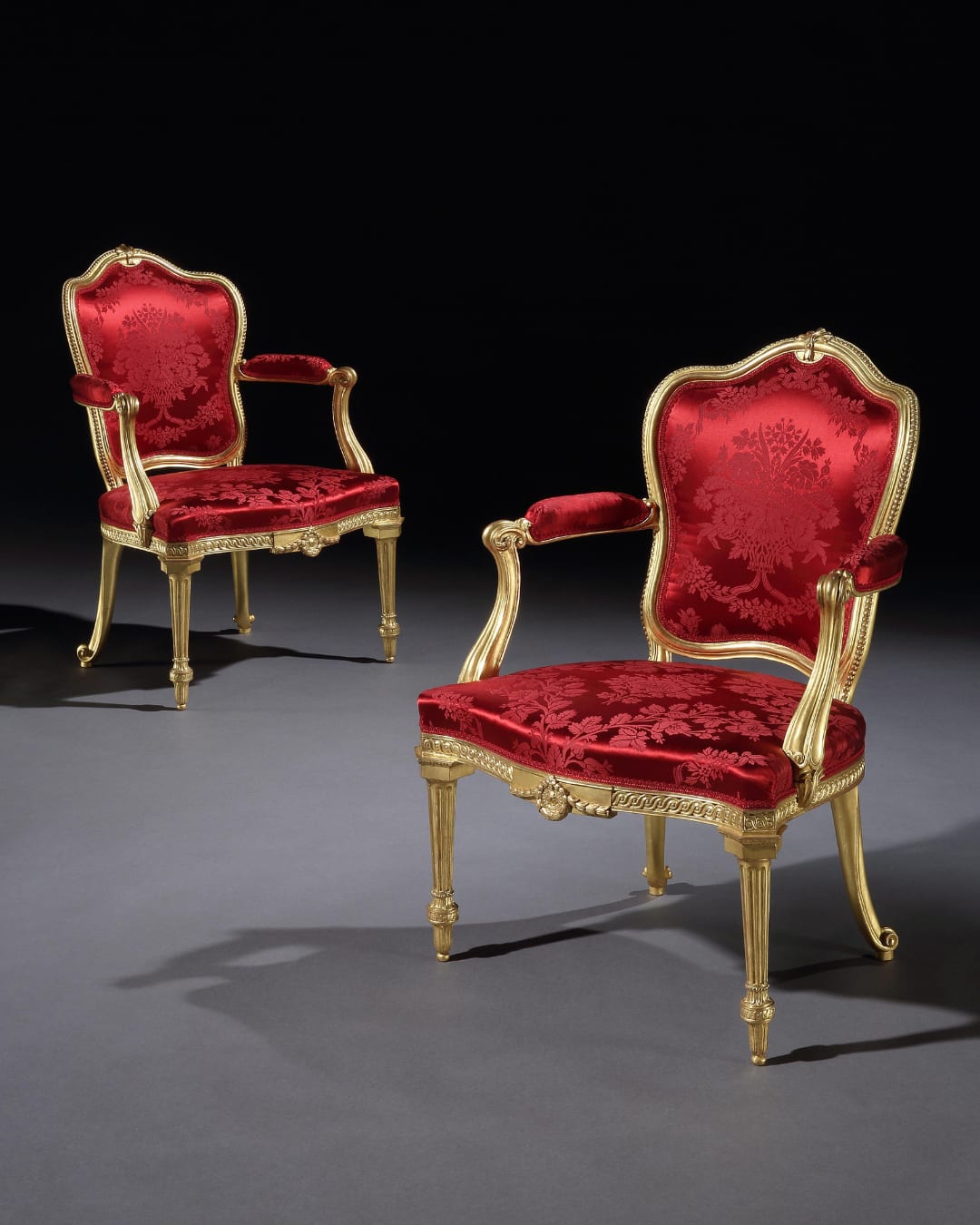 A PAIR OF GEORGE III GILTWOOD ARMCHAIRS, English, circa 1780