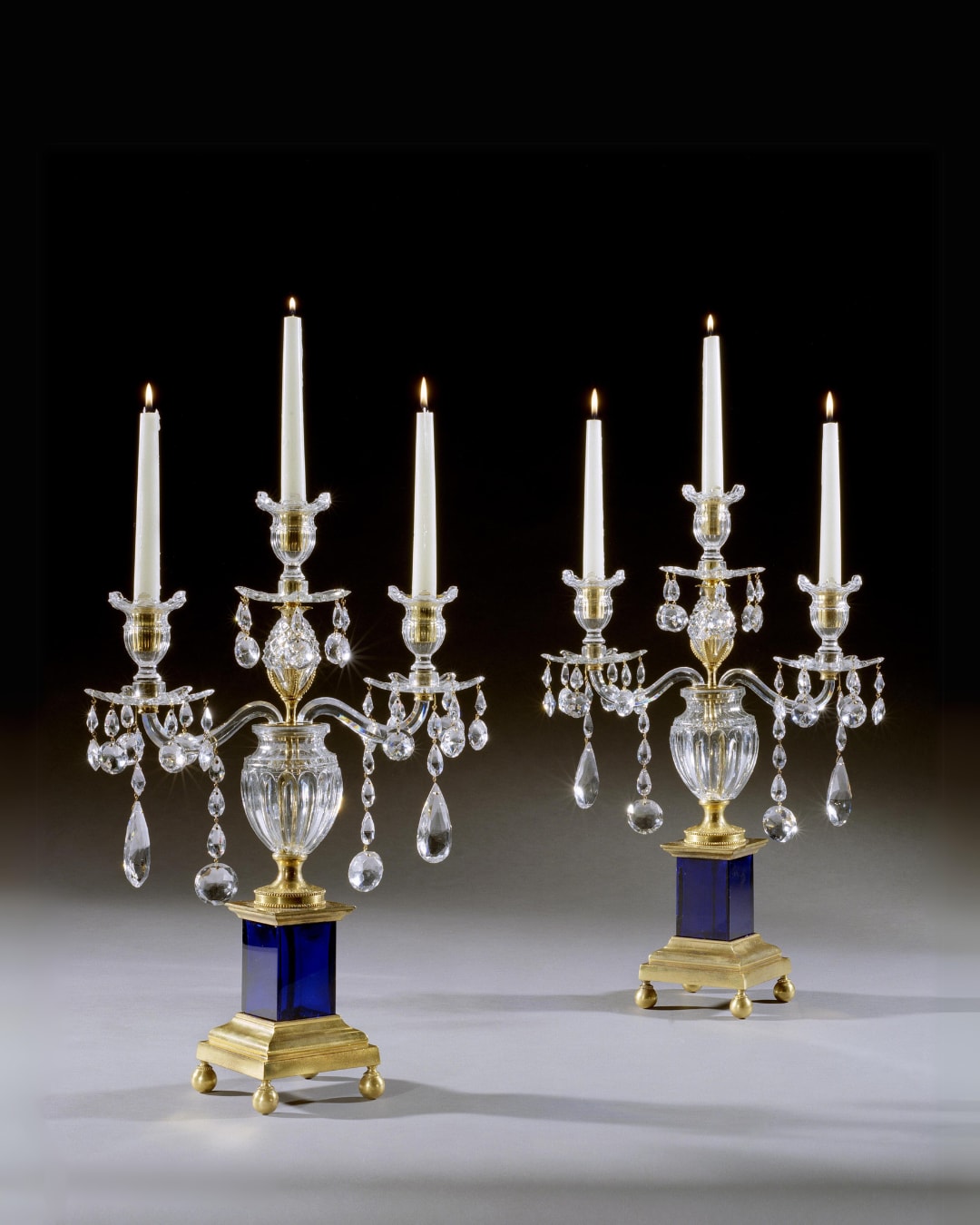 A PAIR OF GEORGE III CUT GLASS CANDELABRA, English, circa 1780