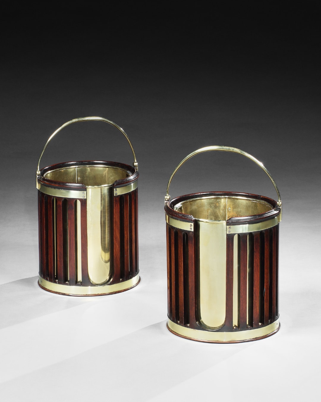 A PAIR OF GEORGE III MAHOGANY PLATE BUCKETS, English, circa 1780