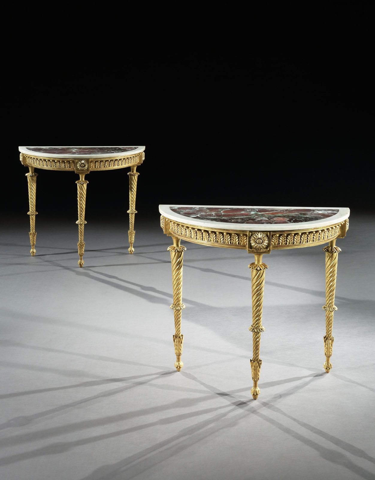 A PAIR OF GEORGE III GILTWOOD SIDE TABLES, English, circa 1780
