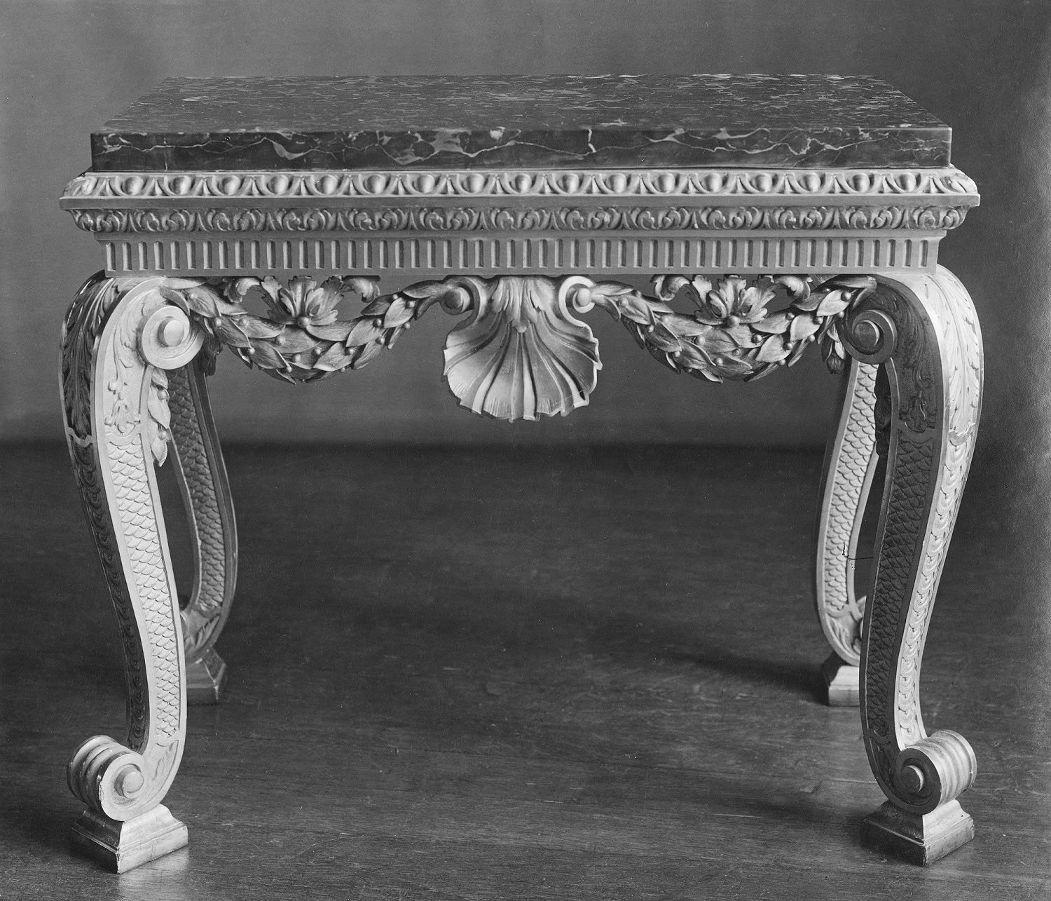 A PAIR OF GEORGE II GILTWOOD TABLES, English, circa 1730