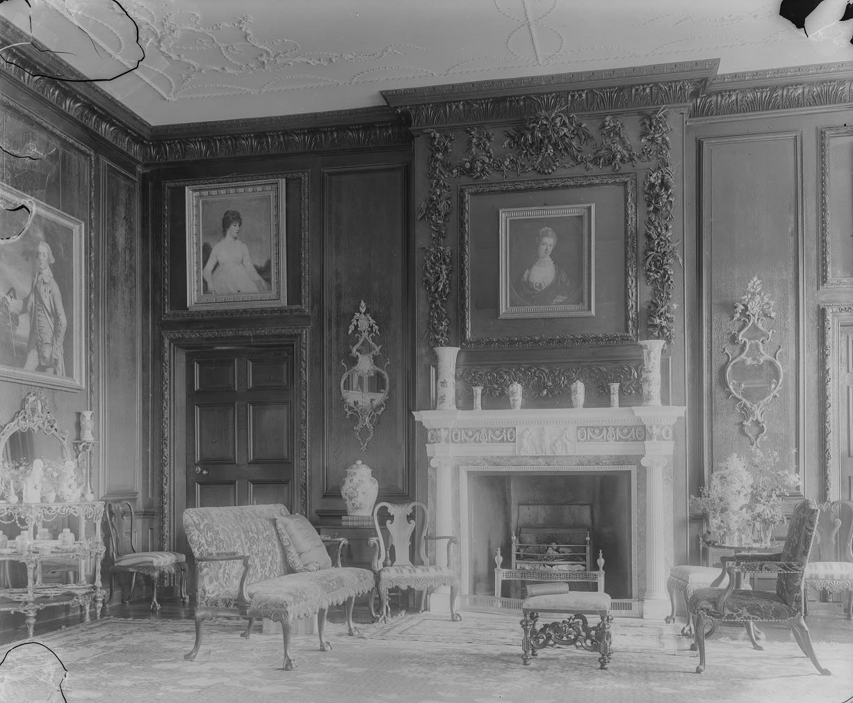 THE PERCIVAL GRIFFITHS RAMSBURY MANOR SETTEE, The settee: English, circa 1750 The associated needlework cover: English, circa 1750