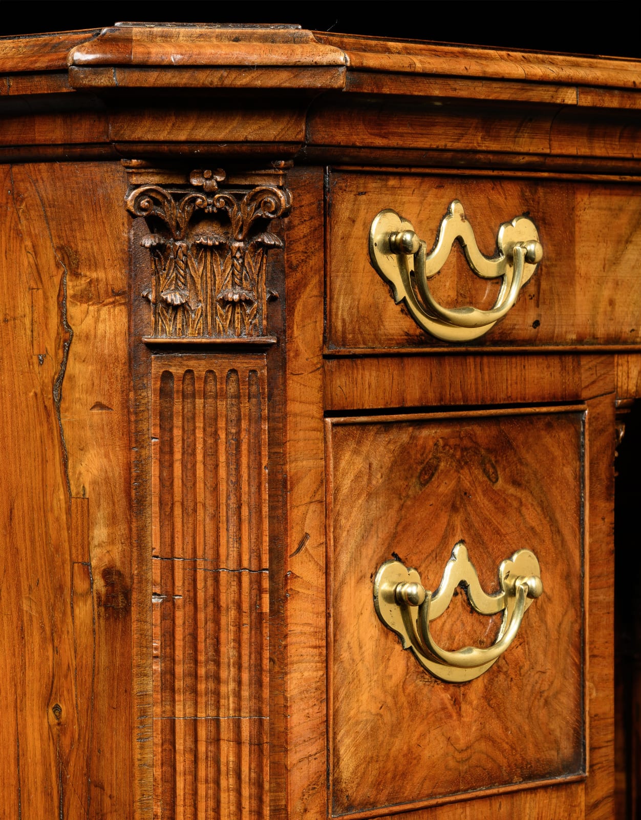 A GEORGE II FIGURED WALNUT KNEEHOLE DESK, English, circa 1740