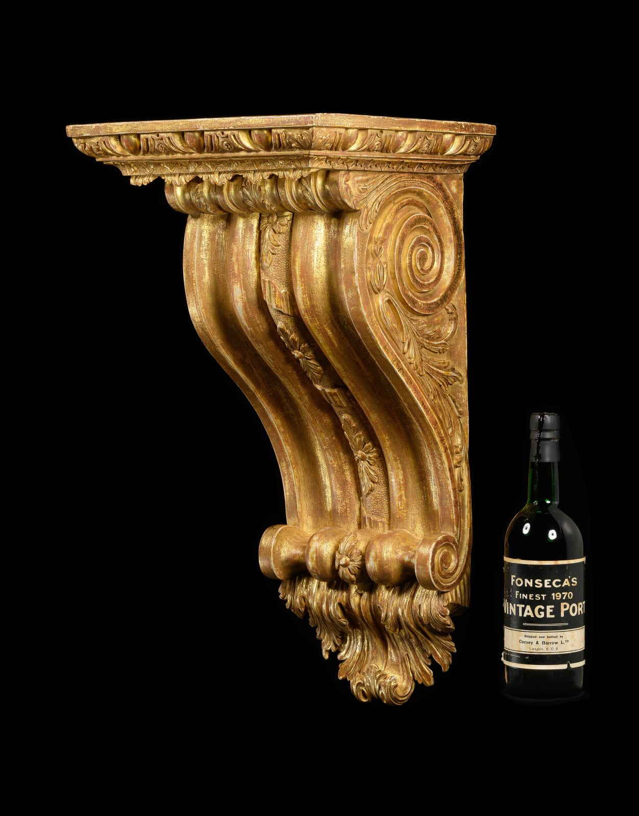 A GEORGE II GILTWOOD BRACKET IN THE MANNER OF WILLIAM KENT, English, circa 1740