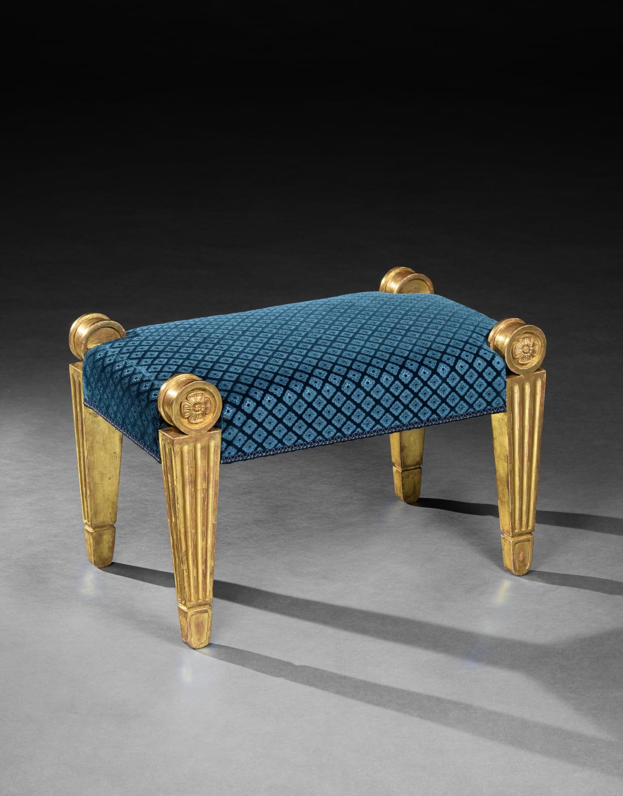 A PAIR OF REGENCY GILTWOOD STOOLS, English, circa 1815