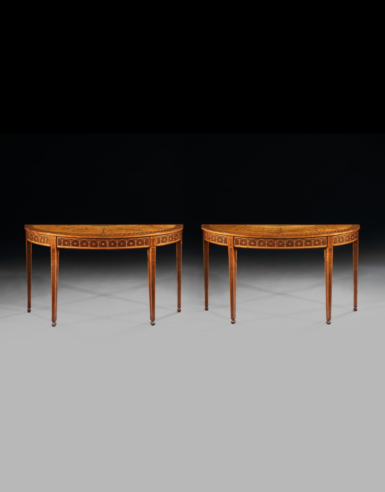 A PAIR OF GEORGE III SIDE TABLES ATTRIBUTED TO MAYHEW AND INCE, English, circa 1780