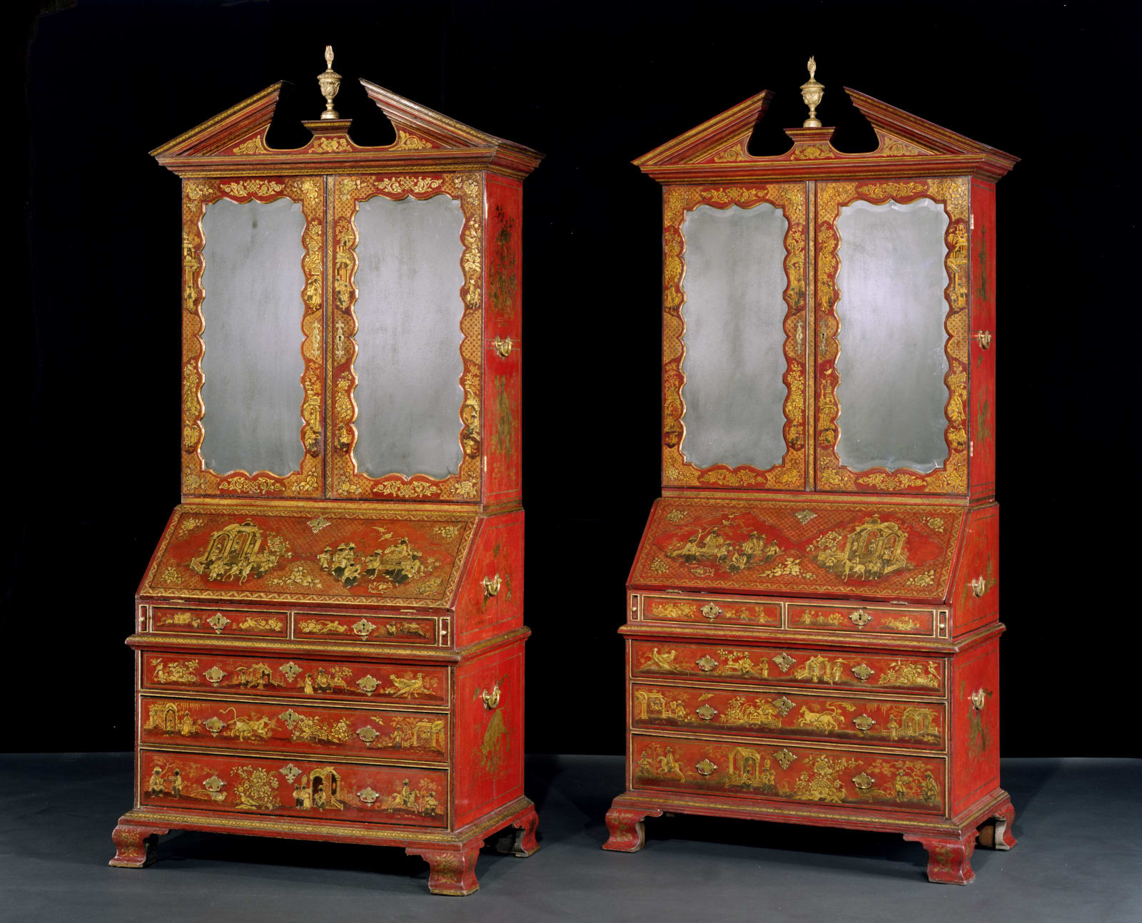 A PAIR OF GEORGE I SCARLET JAPANNED BUREAU BOOKCASES , English, circa 1720
