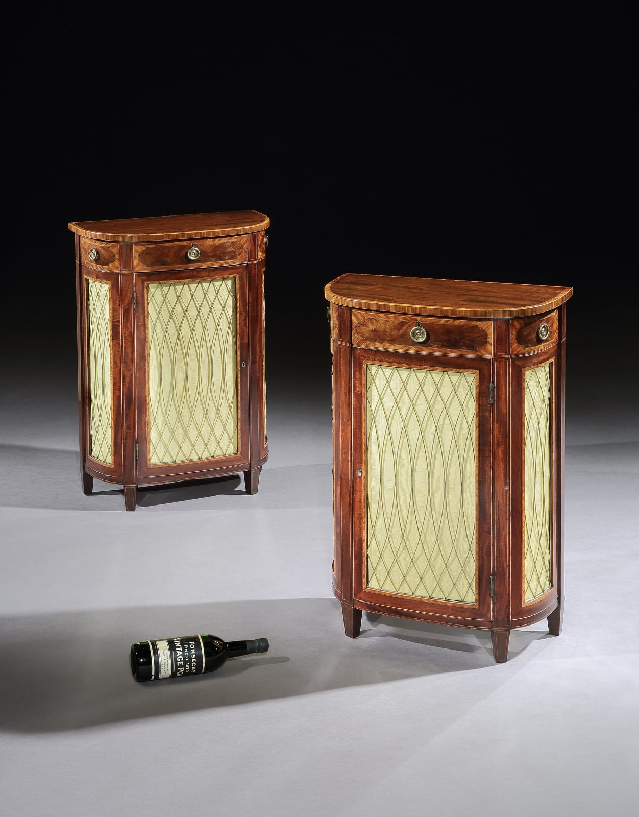 A PAIR OF GEORGE III MAHOGANY SIDE CABINETS, English, circa 1780