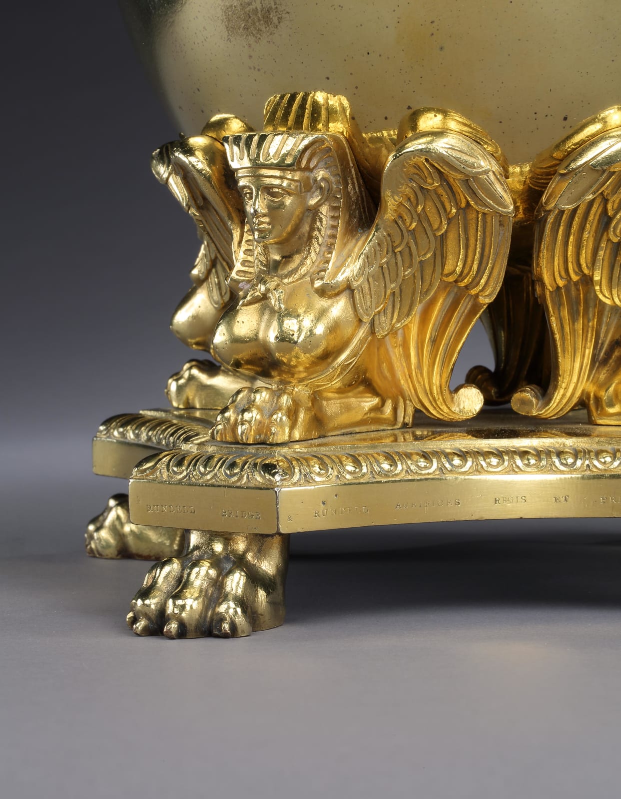 A PAIR OF GEORGE III GILT BRONZE WINE COOLERS, English, circa 1805