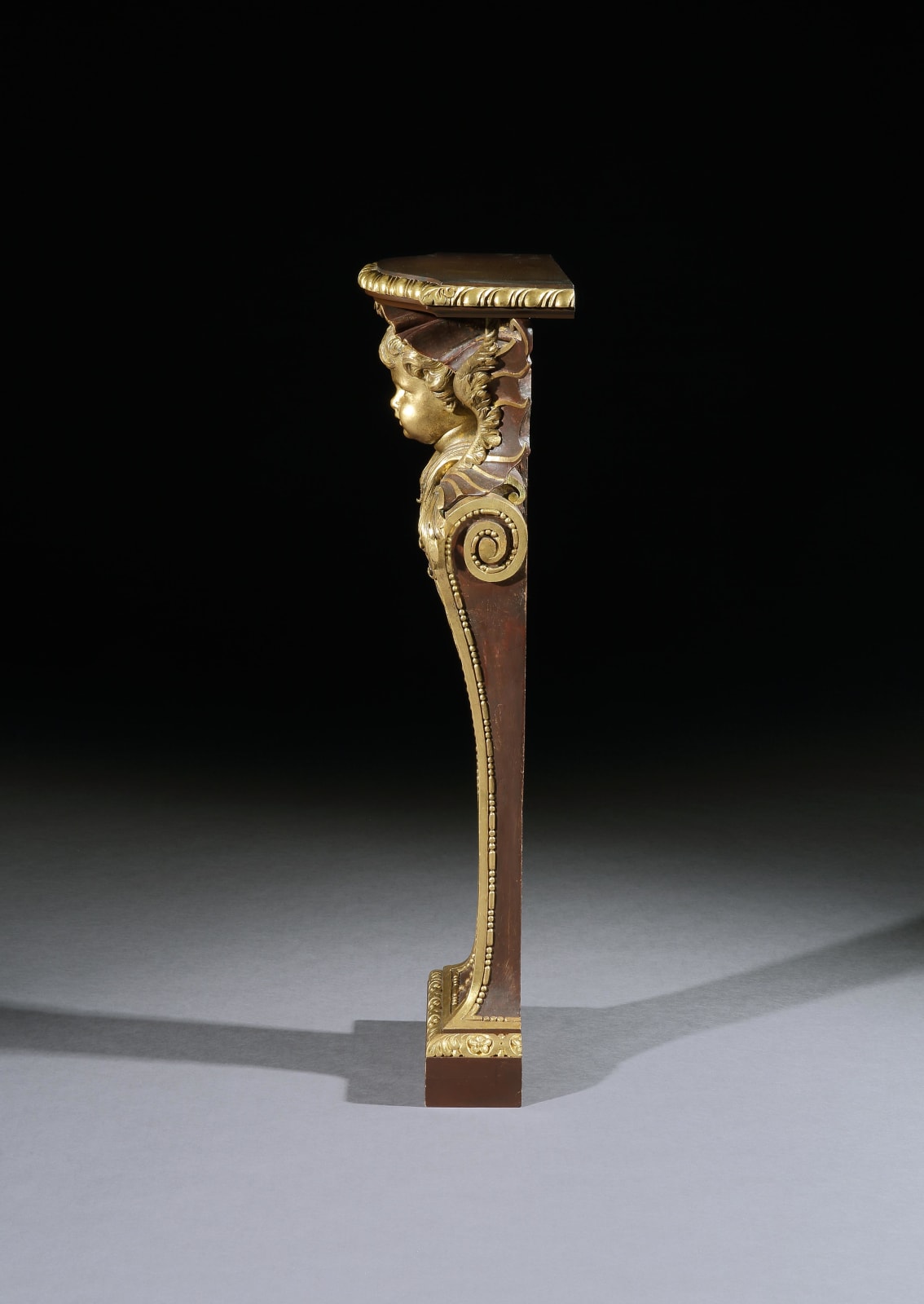 A PAIR OF GEORGE II PARCEL GILT TERMS, English, circa 1730