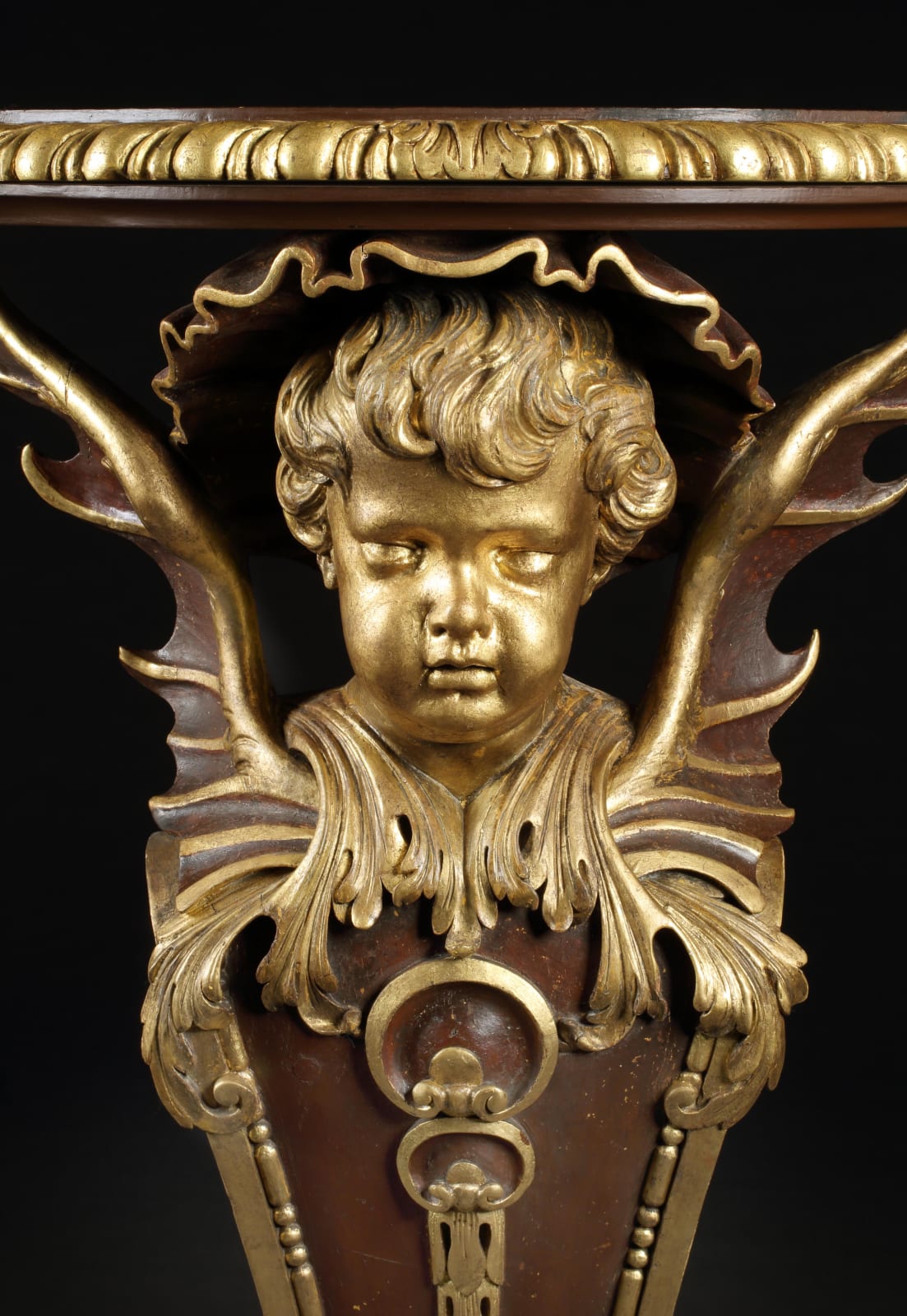 A PAIR OF GEORGE II PARCEL GILT TERMS, English, circa 1730