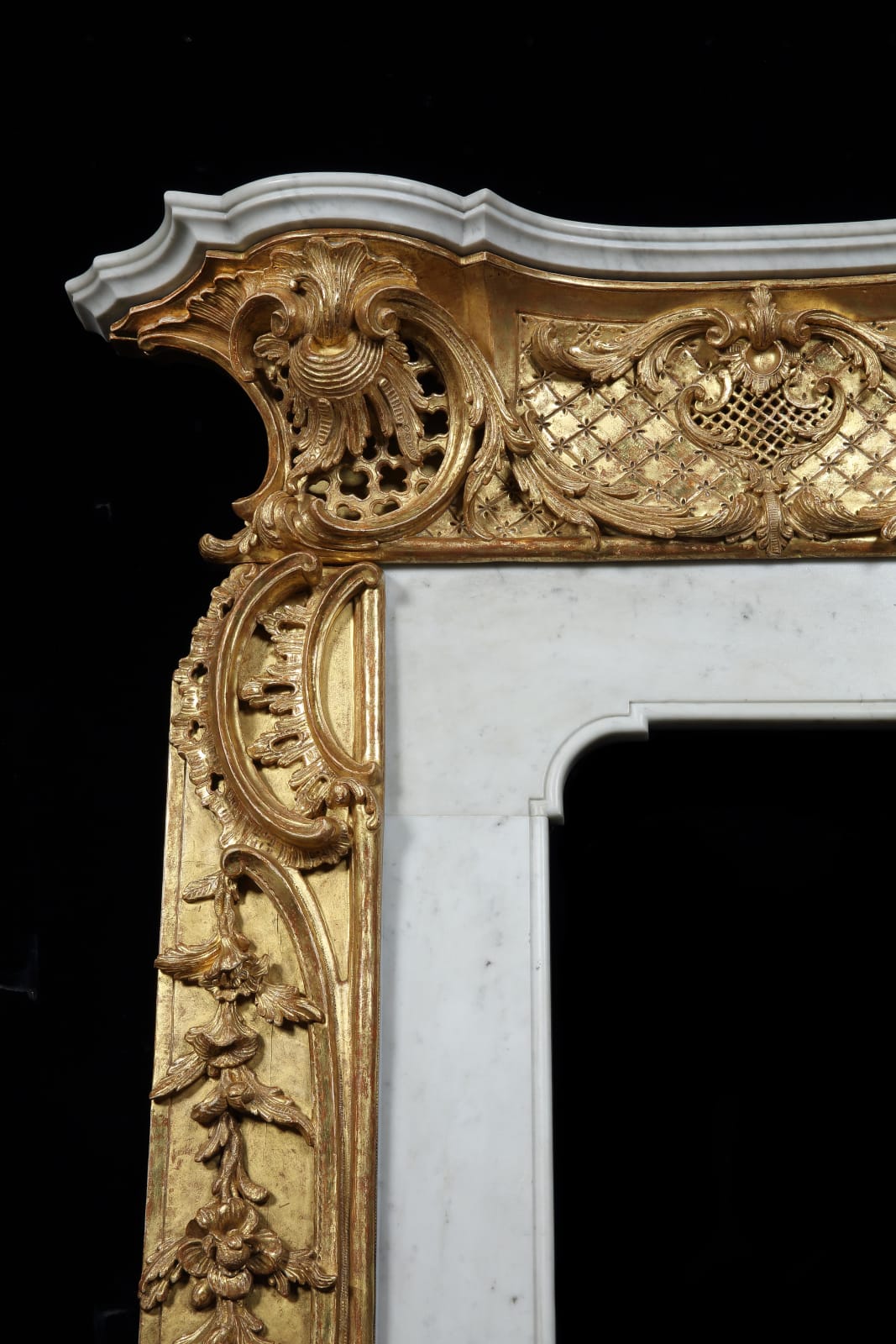 A GEORGE II GILTWOOD AND MARBLE CHIMNEYPIECE , English, circa 1760