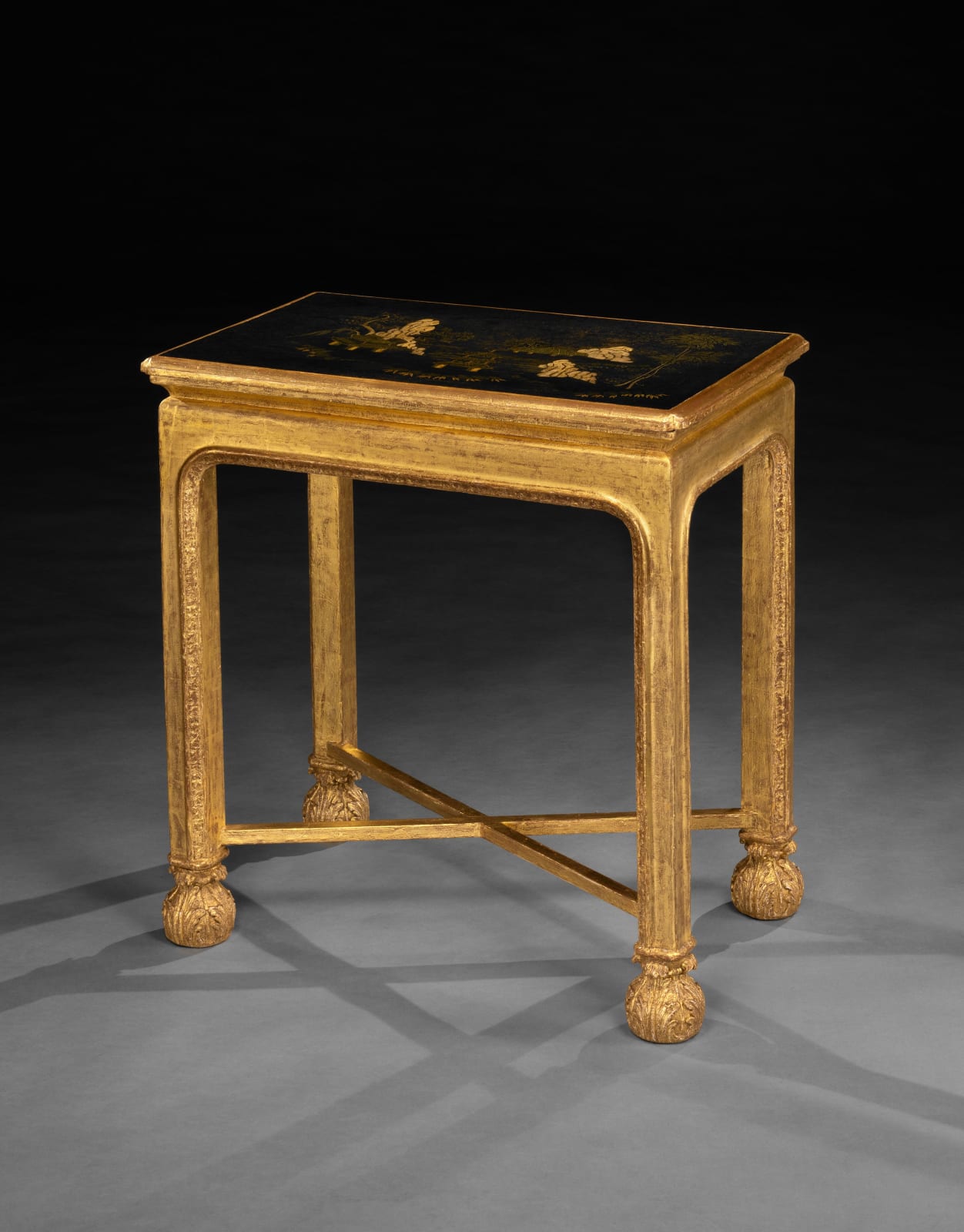A PAIR OF GEORGE I GILTWOOD SIDE TABLES, The bases: English, circa 1725  The japanned tops: English, circa 1685