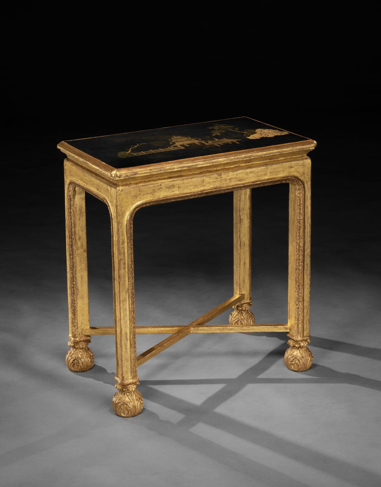 A PAIR OF GEORGE I GILTWOOD SIDE TABLES, The bases: English, circa 1725  The japanned tops: English, circa 1685