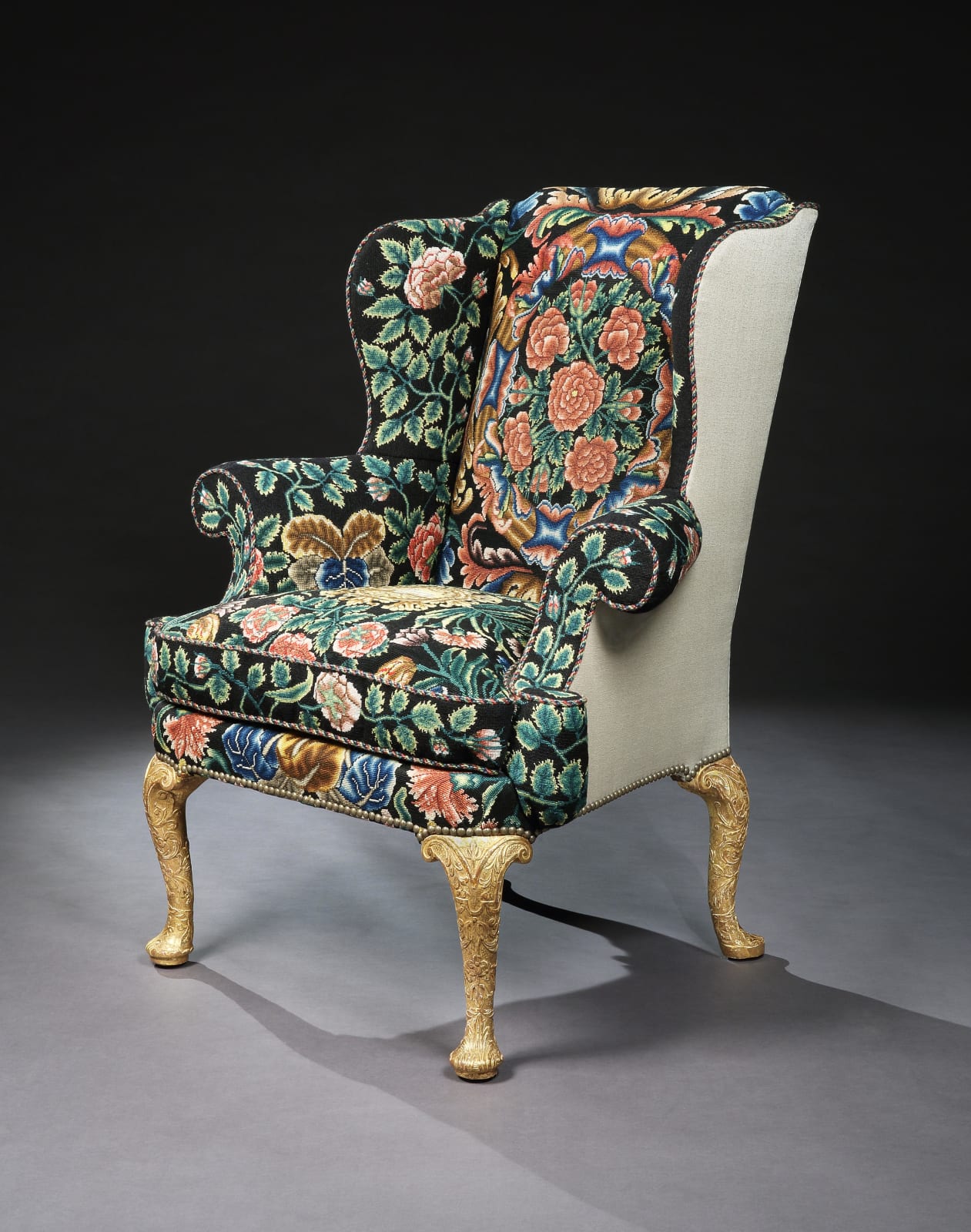 A GEORGE I GESSO AND NEEDLEWORK WING CHAIR, The chair: English, circa 1720  The needlework: English, circa 1720