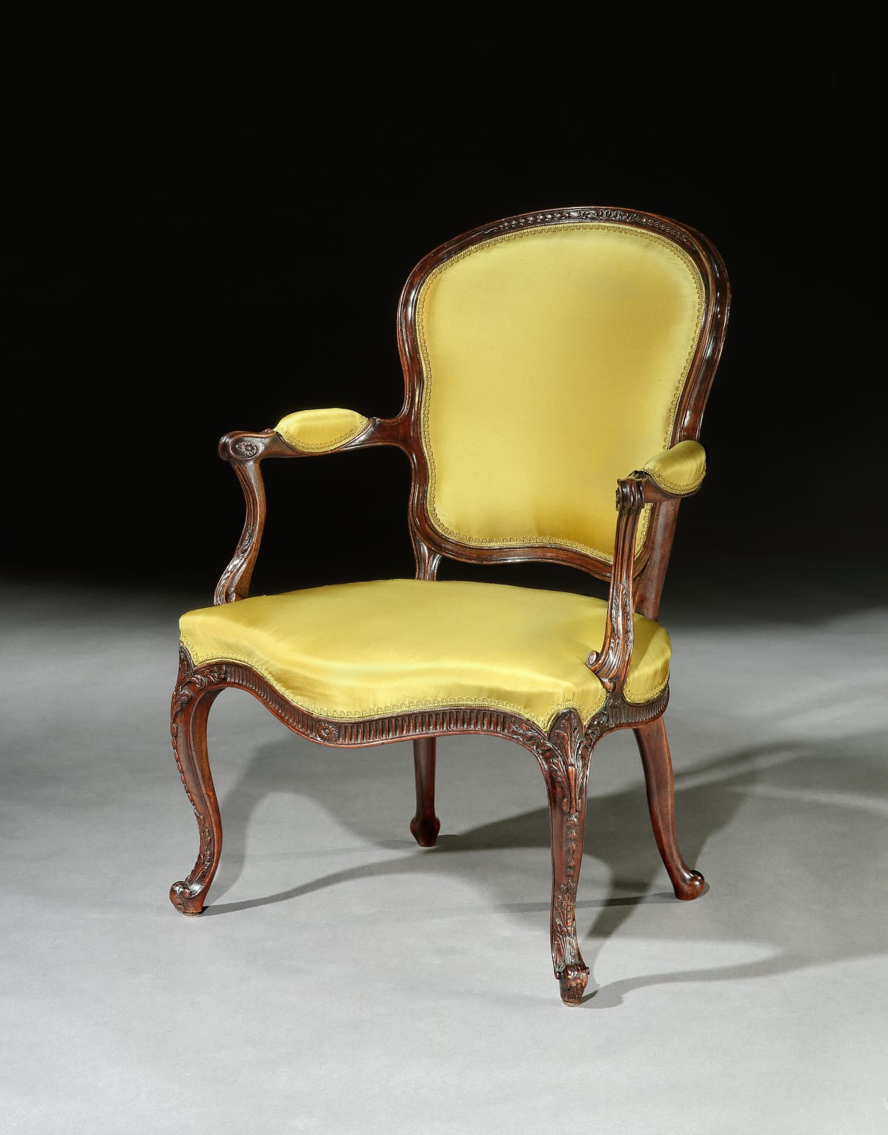 A PAIR OF GEORGE III MAHOGANY ARMCHAIRS, English, circa 1785