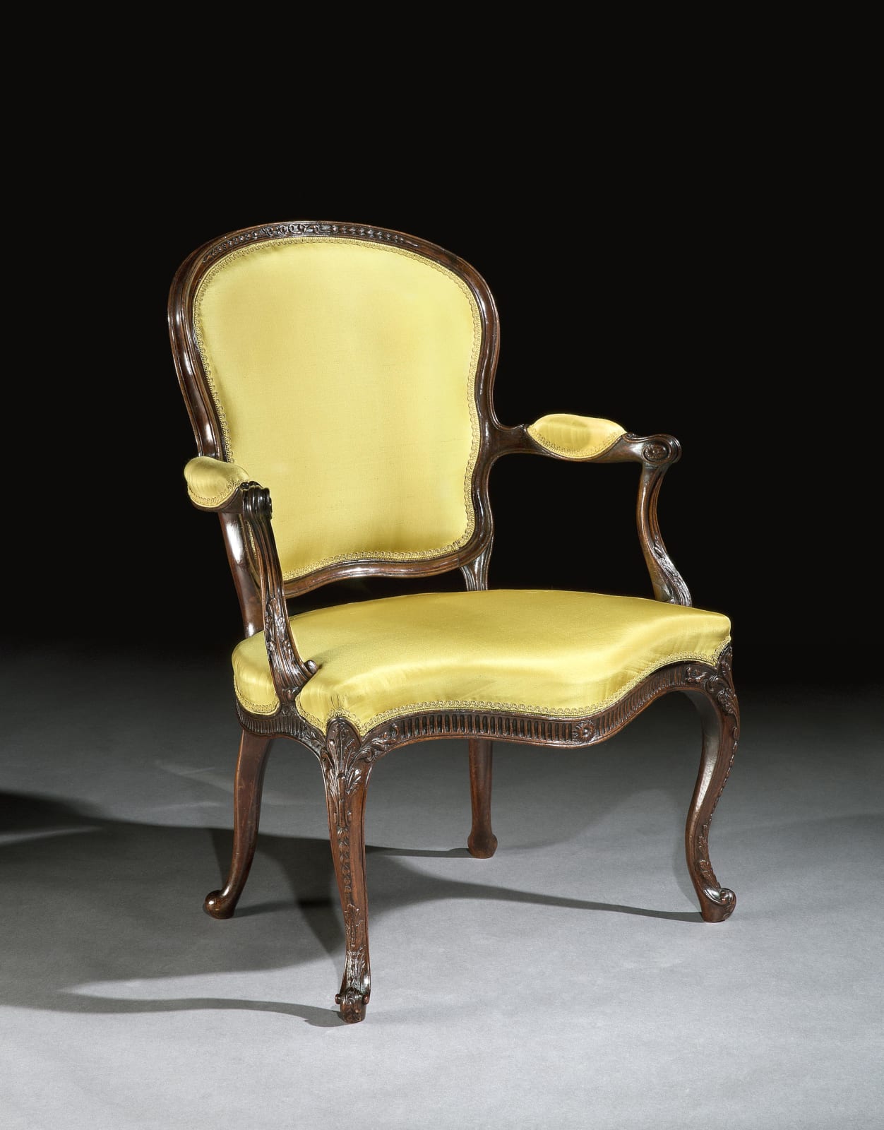 A PAIR OF GEORGE III MAHOGANY ARMCHAIRS, English, circa 1785