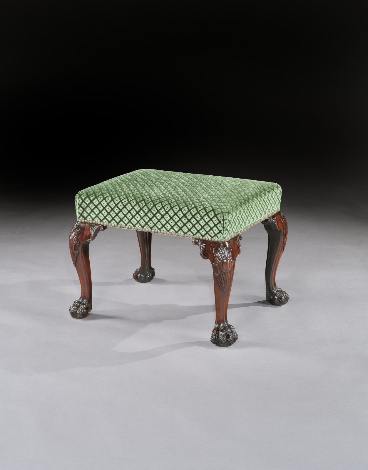 A PAIR OF GEORGE II MAHOGANY STOOLS, English, circa 1755