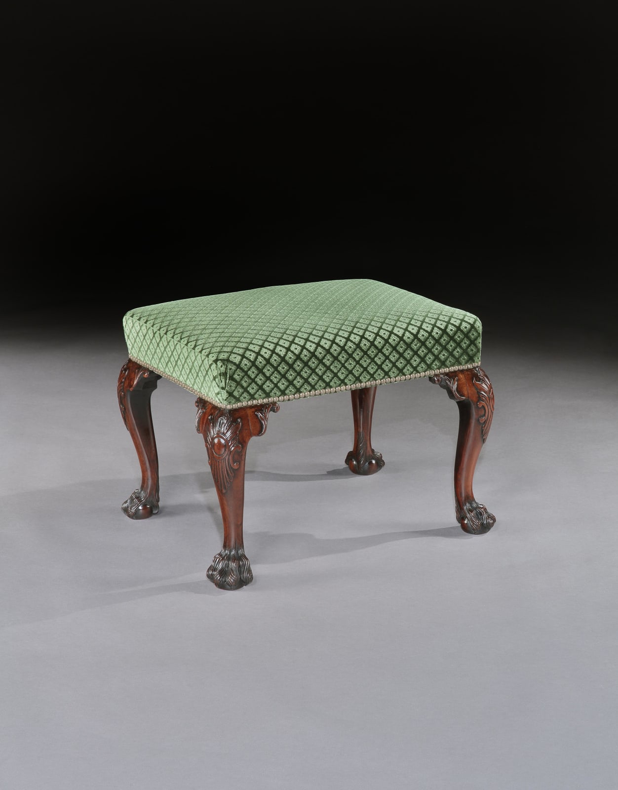 A PAIR OF GEORGE II MAHOGANY STOOLS, English, circa 1755