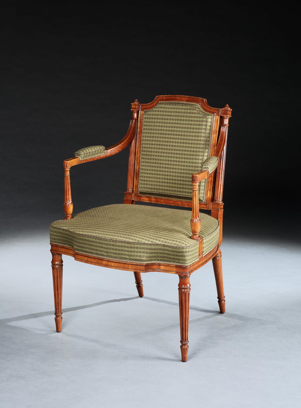 A SET OF SIX GEORGE III SATINWOOD ARMCHAIRS , English, circa 1785