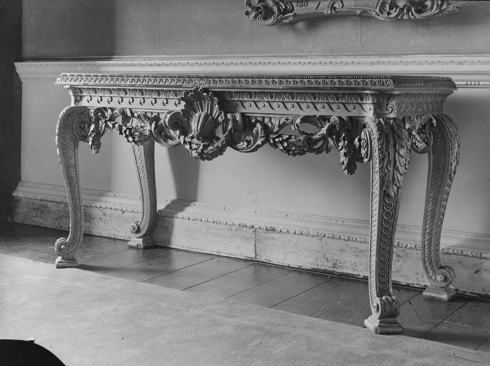 THE HOUGHTON HALL PORPHYRY SIDE TABLES, English, circa 1730