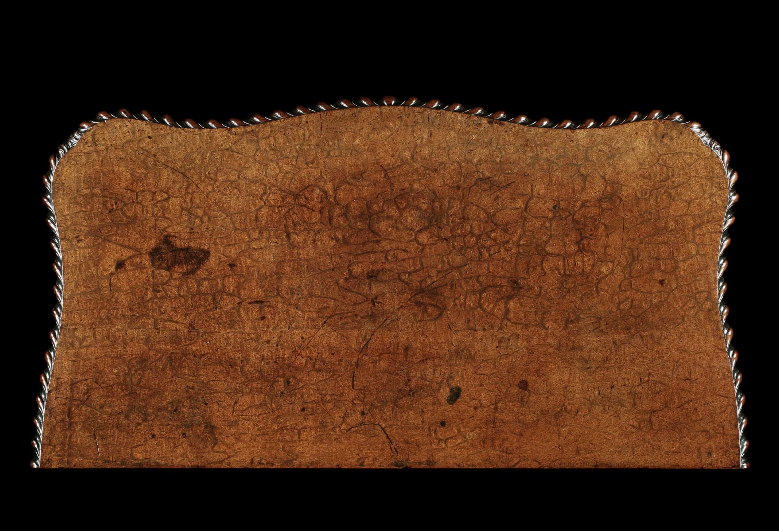 A GEORGE II QUILTED MAHOGANY COMMODE, English, circa 1750