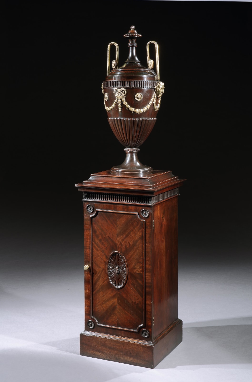 A PAIR OF GEORGE III PEDESTALS PROBABLY BY THOMAS CHIPPENDALE, English, circa 1780