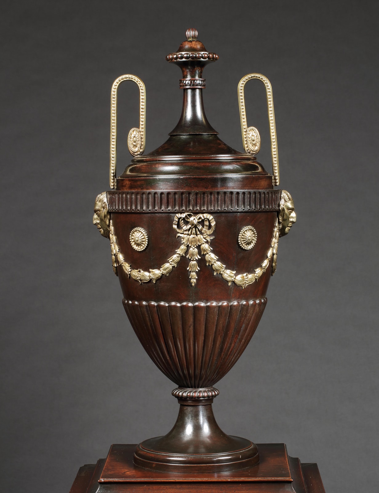 A PAIR OF GEORGE III PEDESTALS PROBABLY BY THOMAS CHIPPENDALE, English, circa 1780