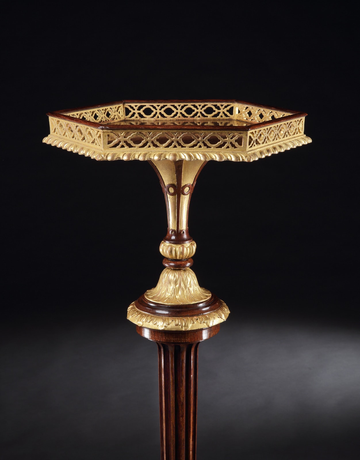 A PAIR OF GEORGE III ROSEWOOD TORCHÈRES , English, circa 1765