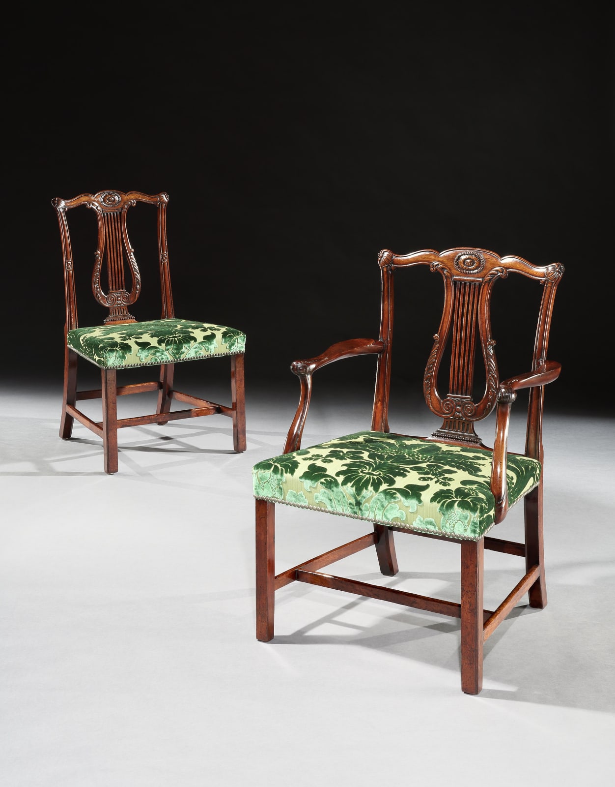 A SET OF TWELVE GEORGE III MAHOGANY DINING CHAIRS, English, circa 1770
