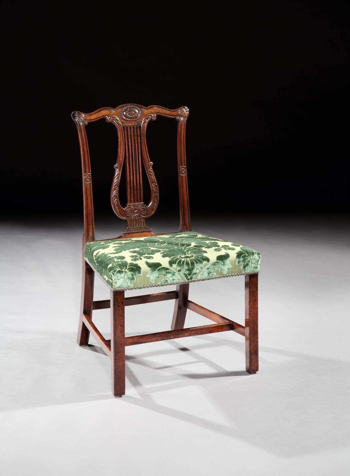 A SET OF TWELVE GEORGE III MAHOGANY DINING CHAIRS, English, circa 1770