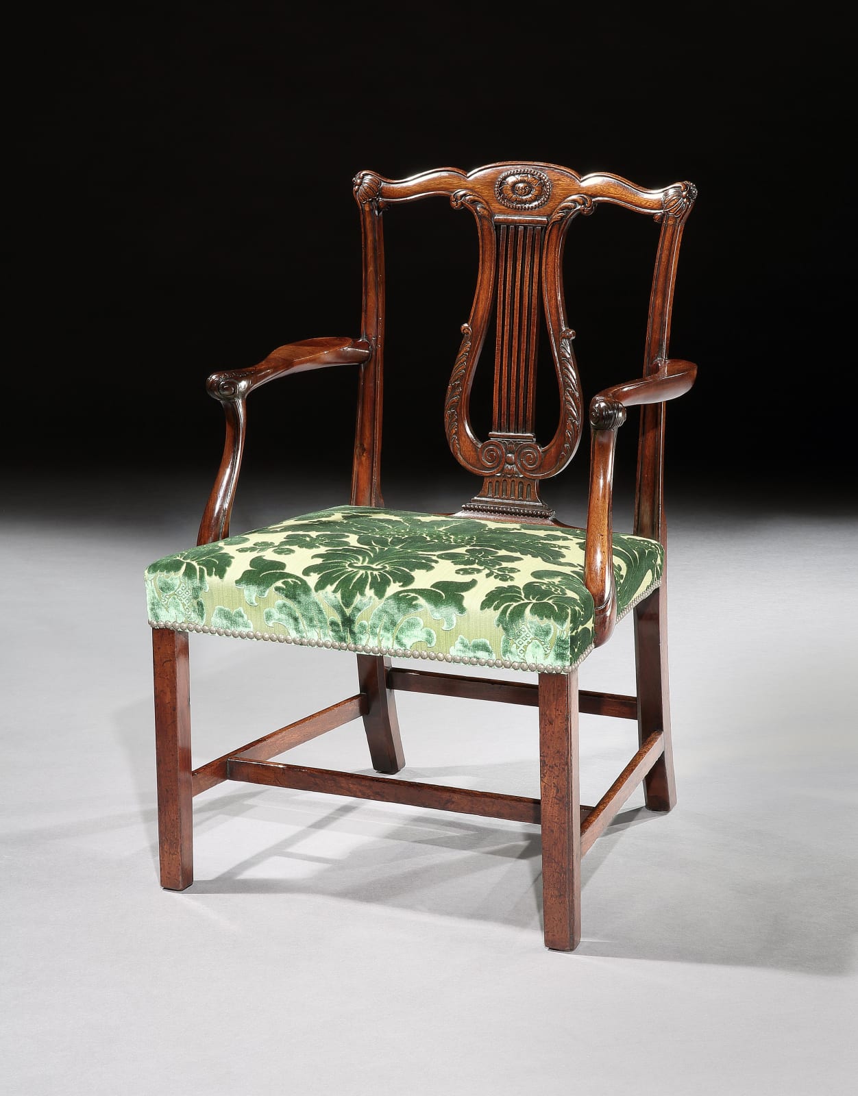 A SET OF TWELVE GEORGE III MAHOGANY DINING CHAIRS, English, circa 1770