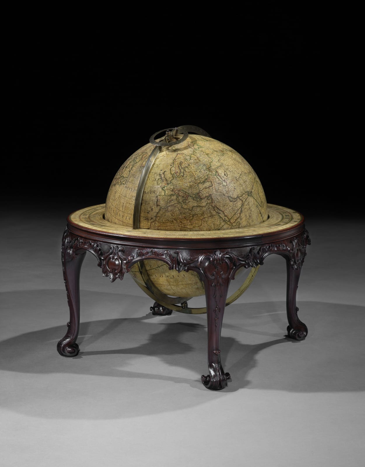 A PAIR OF GEORGE II 16 INCH GLOBES BY JOHN SENEX, The globes: English, dated 1740  The stands: English, circa 1755