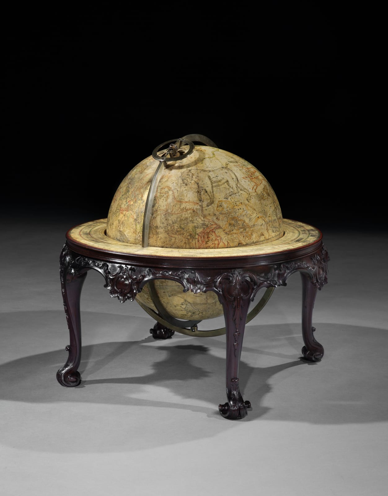 A PAIR OF GEORGE II 16 INCH GLOBES BY JOHN SENEX, The globes: English, dated 1740  The stands: English, circa 1755