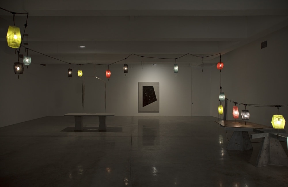 Boyce installation image at TBG NY, dark room with lanterns