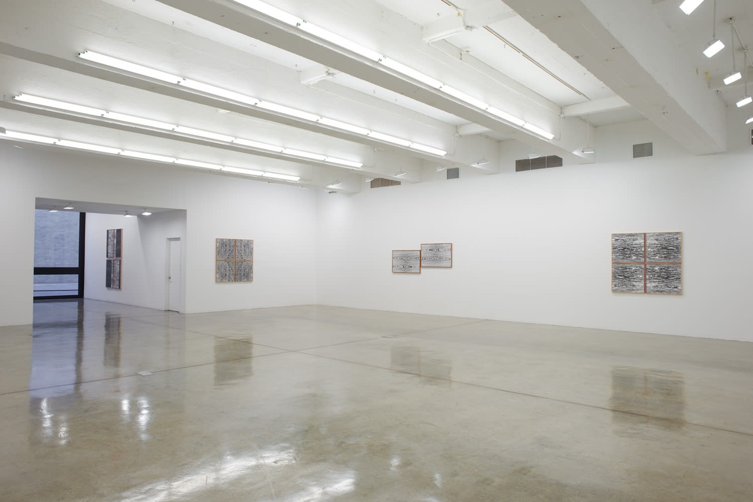 Lisa Oppenheim installation view, wood cut photographs