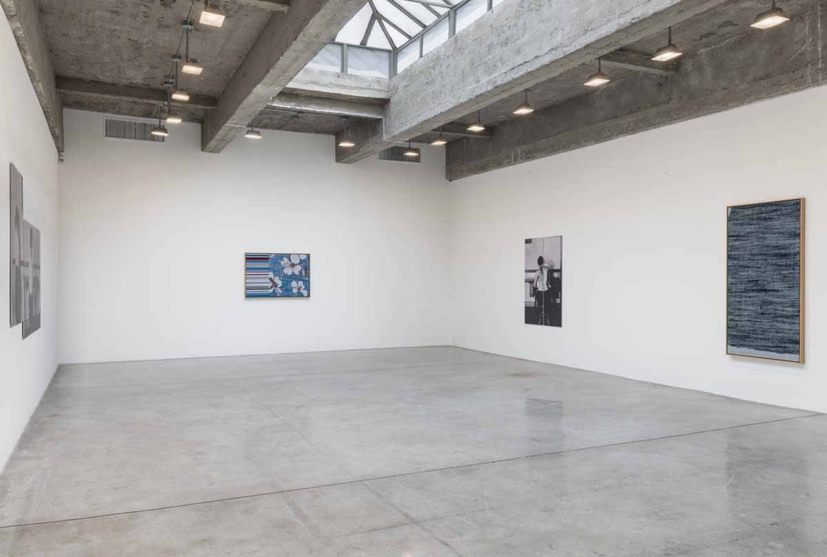 Lisa Oppenheim installation view, women working photographs