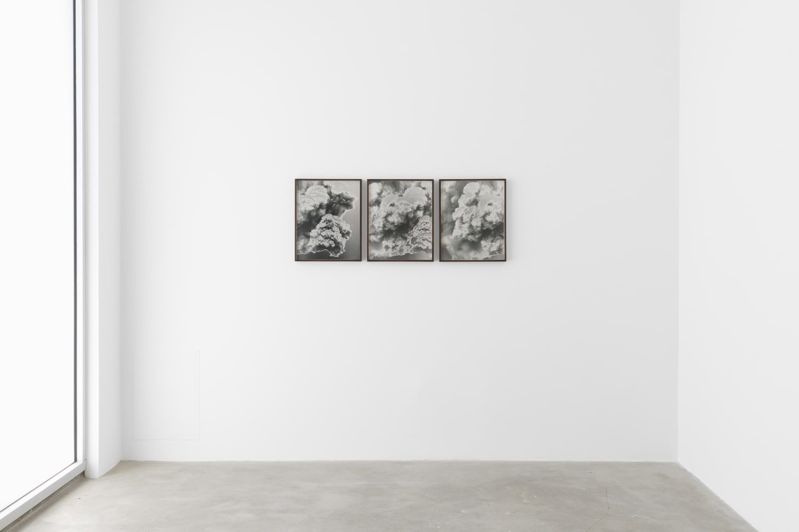 Installation view of Lisa Oppenheim, smoke cloud photograph