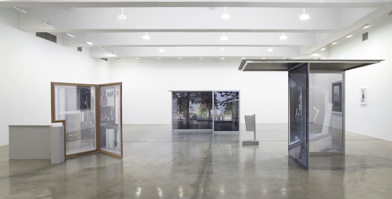 image of Hornig sculptures with transparent photographs