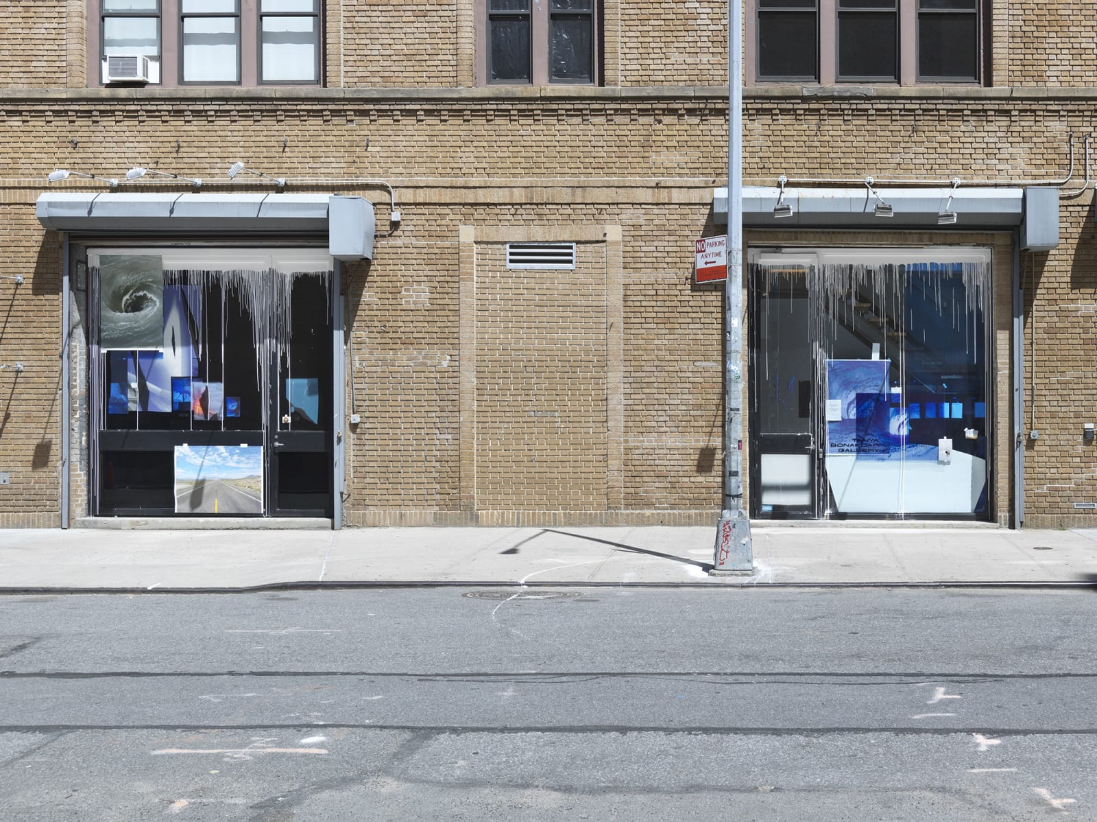 outside of gallery with collaged windows