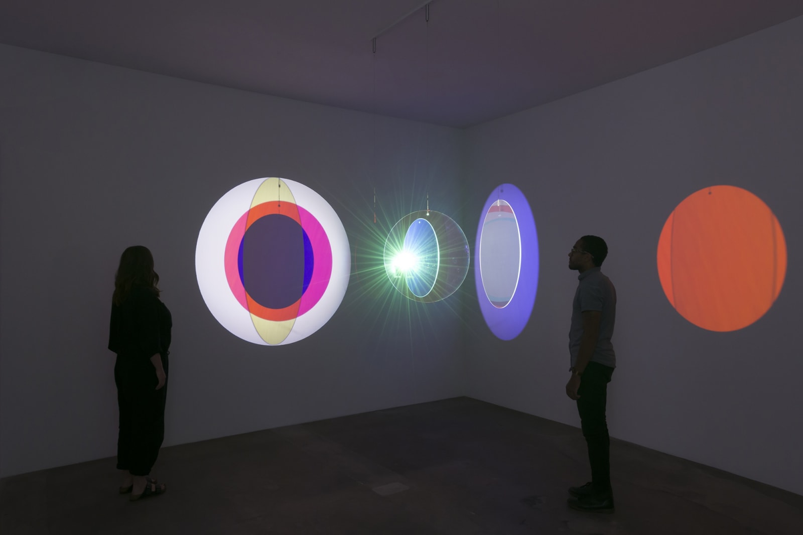 image of eliasson, lens flare installation in dark room