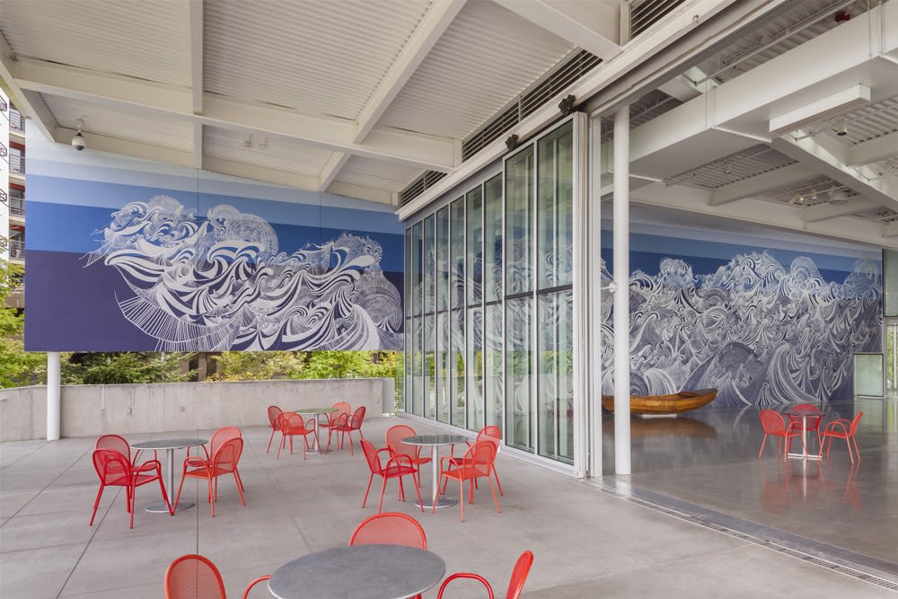 Large wave mural with boat