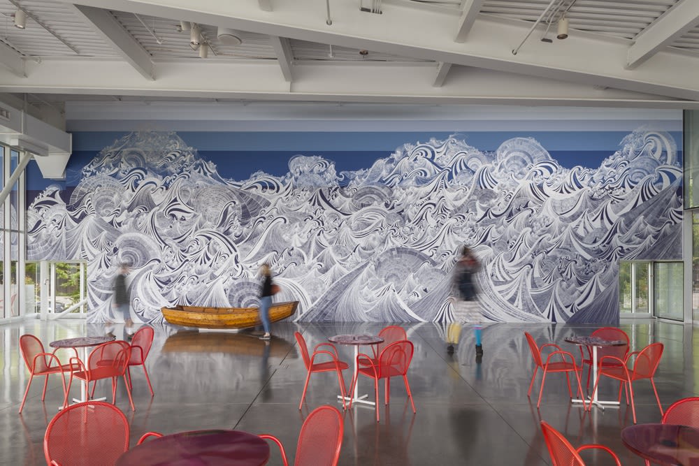 Large wave mural with boat