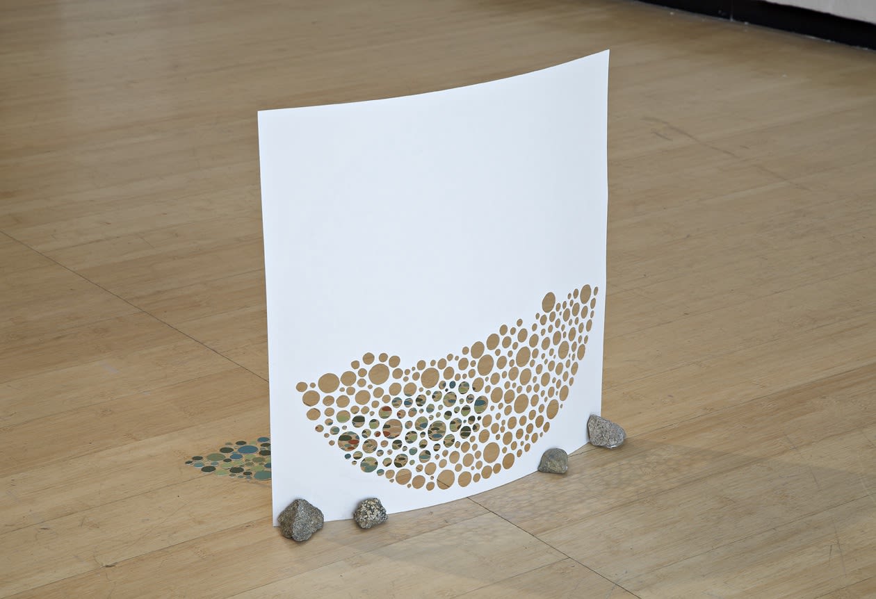 image of a paper sculpture on the floor